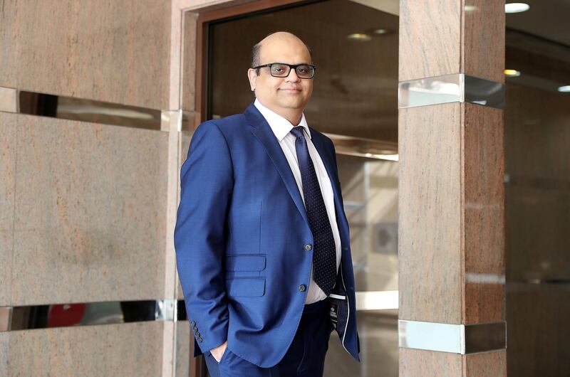 DUBAI , UNITED ARAB EMIRATES , JAN 14 – 2018 :- Rajeev Samtani , co – founder and managing partner of Xcel Accounting at his office in Dubai National Insurance Building on Sheikh Zayed Road in Dubai.  (Pawan Singh / The National) For Business. Story by Gillian Duncan