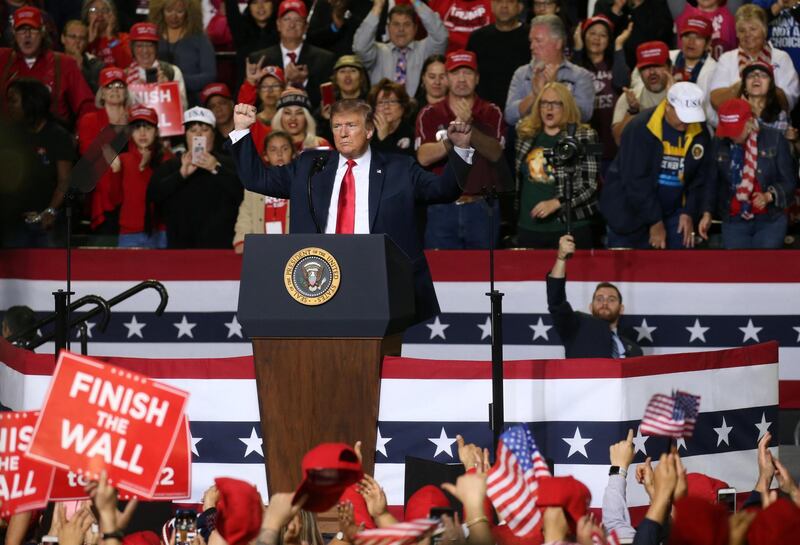 Donald Trump reacts during a campaign rally. Reuters