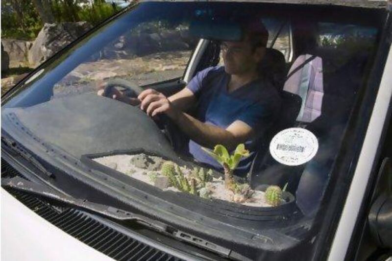 Reuben Roberts uses all available space in his Toyota Corolla to grow plants. Andrea Willmore for The National