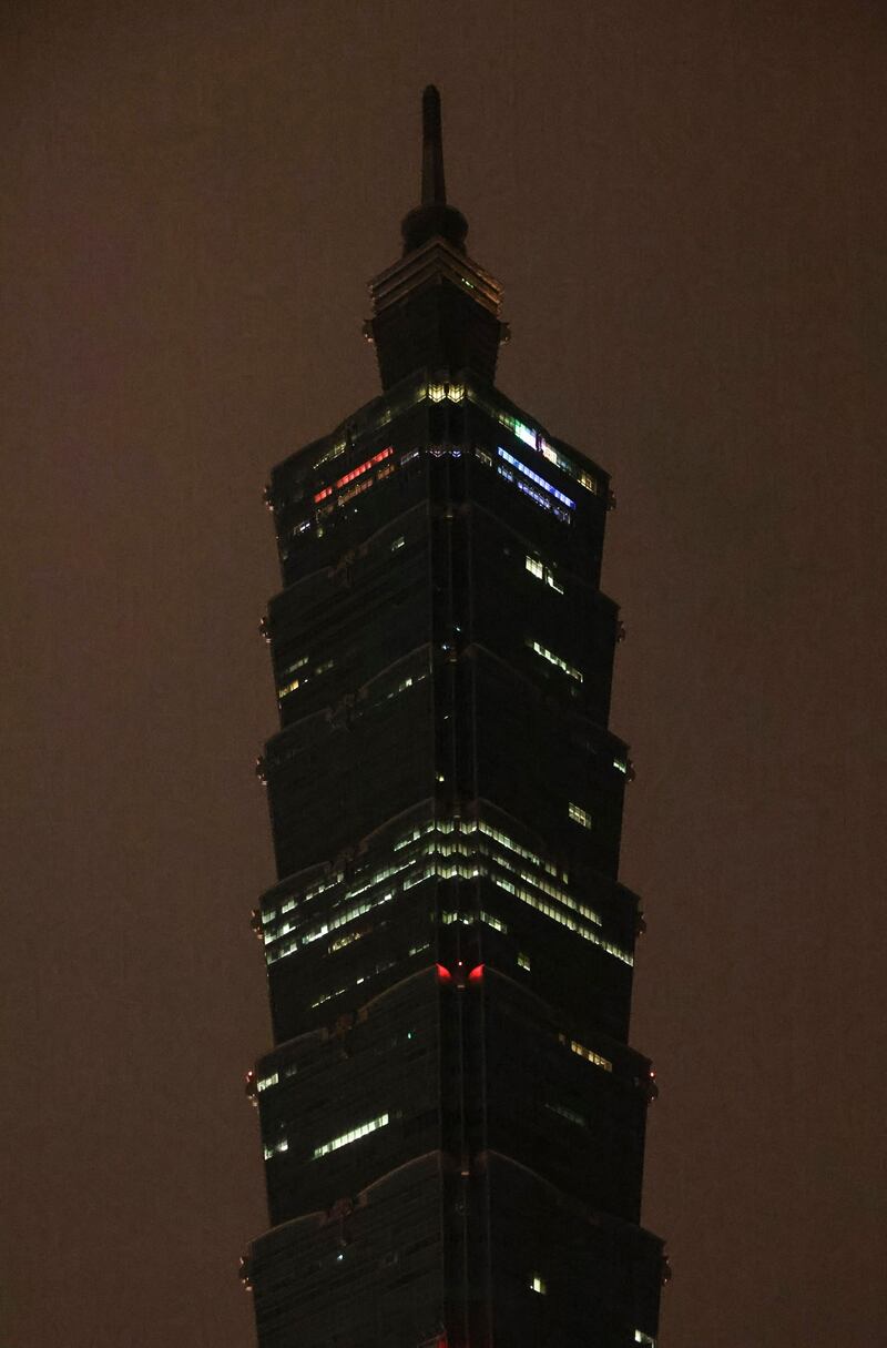 The landmark building Taipei 101 is seen with its lights switched off to mark the Earth Hour environmental campaign in Taipei. AFP