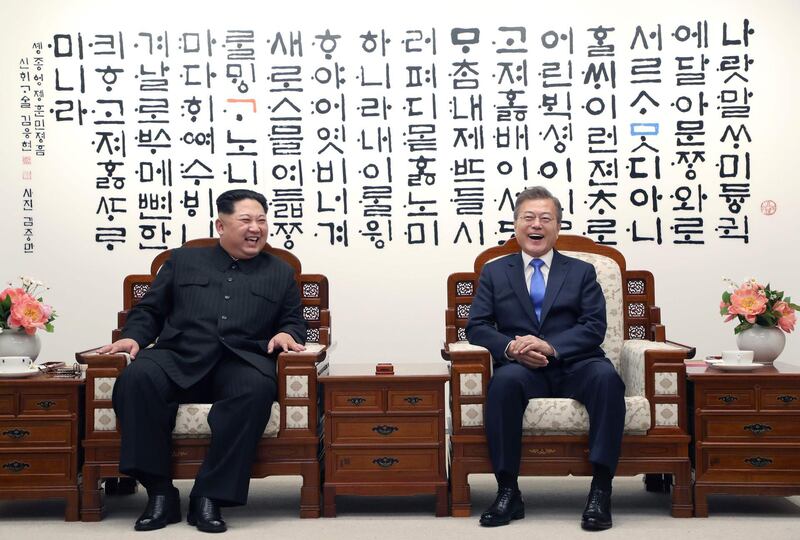 The leaders share a lighter moment. Korea Summit Press Pool / Korea Summit Press Pool