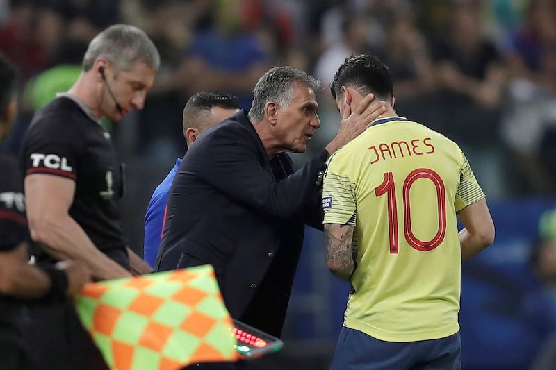 epa07681316 Colombia's James Rodriguez (R) talks with the head coach Carlos Queiroz (C) during the Copa America 2019 quarter-finals soccer match between Colombia and Chile at Arena Corinthians in Sao Paulo, Brazil, 28 June 2019.  EPA/FERNANDO BIZERRA