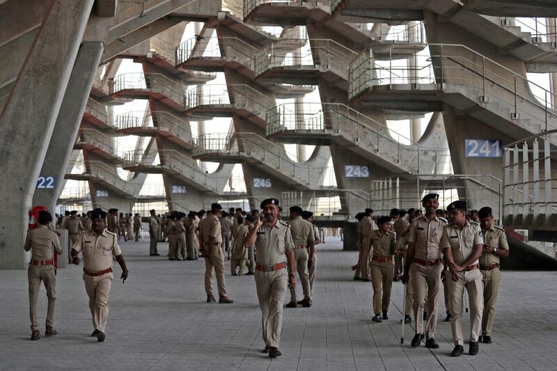 Indian policemen walk at Sardar Patel stadium ahead of the visit of US President Donald Trump. AP Photo