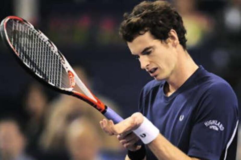 Andy Murray wins a point during his victory over Roger Federer in Shanghai.