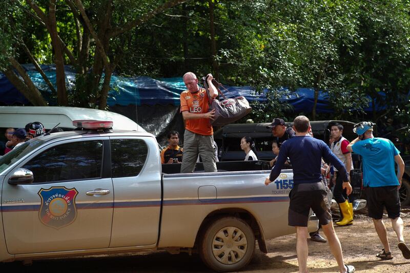 British caver Vernon Unsworth (C) gets out of a pick up truck near the Tham Luang cave complex, where 12 boys and their soccer coach are trapped, in the northern province of Chiang Rai, Thailand, July 5, 2018. Picture taken July 5, 2018. REUTERS/Panu Wongcha-um