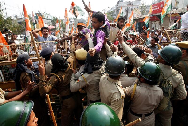 Demonstrators try to cross a police barricade during a protest in Agartala, India, organised by India’s main opposition Congress party against demonetisation. Reuters / Jayanta Dey / February 17, 2017