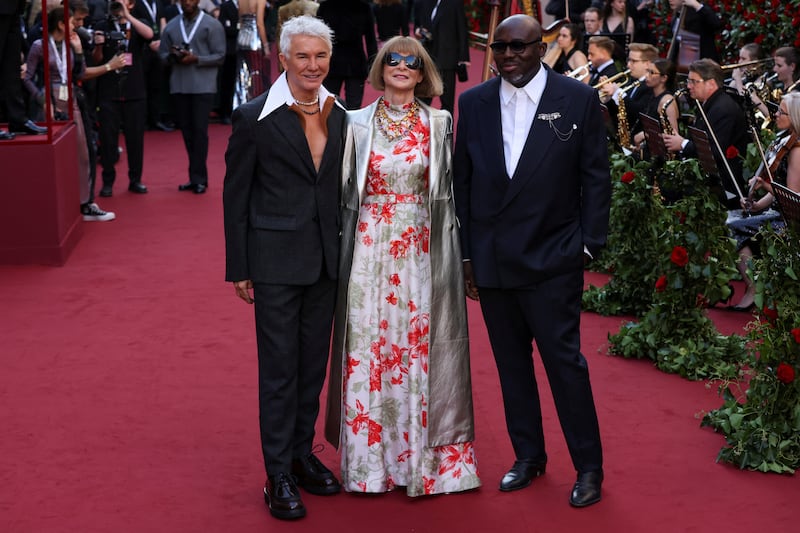 From left, Australian filmmaker Baz Luhrmann with Vogue's Anna Wintour and Edward Enninful. Reuters 