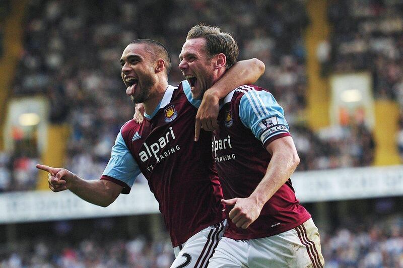 Centre-back Winston Reid, left, defended doggedly and got West Ham's vital opener in their unexpected win over Tottenham. Carl Court / AFP