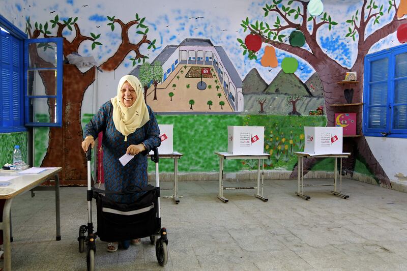 A Tunisian woman votes during the referendum in the Ben Arous region near Tunis. AFP