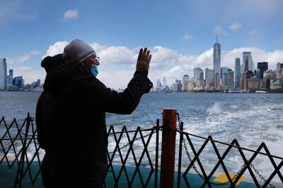 NEW YORK, NY - MAY 09: The Manhattan skyline stands in the distance as people ride the Staten Island Ferry, which commutes between Staten Island and Manhattan on May 09, 2020 in New York City. Hospitals in New York City, which have been especially hard hit by the coronavirus, are just beginning to see a downturn in COVID-19 cases.   Spencer Platt/Getty Images/AFP
== FOR NEWSPAPERS, INTERNET, TELCOS & TELEVISION USE ONLY ==
