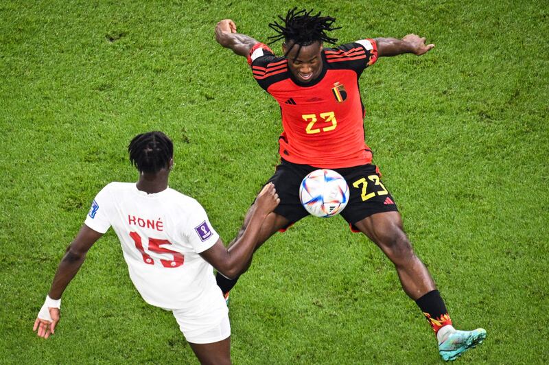 Belgium's forward #23 Michy Batshuayi and Canada's midfielder #15 Ismael Kone fight for the ball. AFP