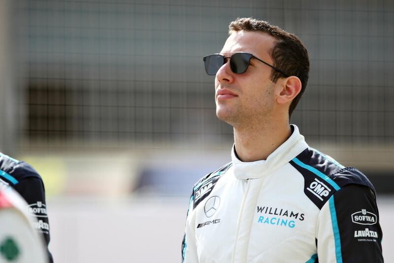 BAHRAIN, BAHRAIN - MARCH 12: Nicholas Latifi of Canada and Williams looks on from the grid during Day One of F1 Testing at Bahrain International Circuit on March 12, 2021 in Bahrain, Bahrain. (Photo by Joe Portlock/Getty Images)