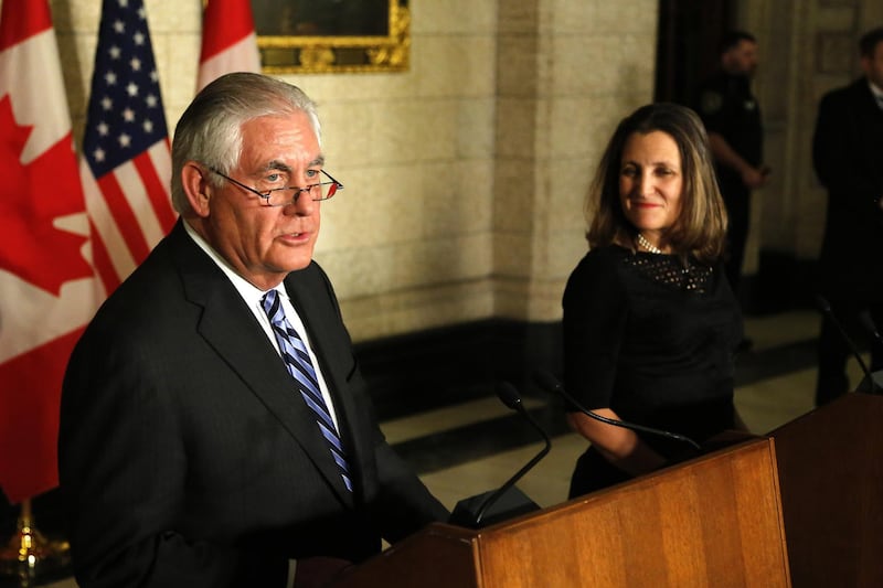 Rex Tillerson, U.S. Secretary of State, left, speaks as Chrystia Freeland, Canada's minister of foreign affairs, listens during a joint press conference on Parliament Hill in Ottawa, Ontario, Canada, on Tuesday, Dec. 19, 2017. The visit is an opportunity for the Tillerson and Freeland to discuss Canada-United States cooperation on important bilateral, regional and global issues that impact people in both countries. Photographer: Patrick Doyle/Bloomberg