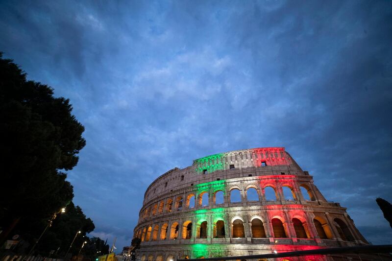 The Italian tricolor is projected onto the Colosseum, during Phase 2 of the emergency Covid-19 plan, in Rome, Italy.  EPA