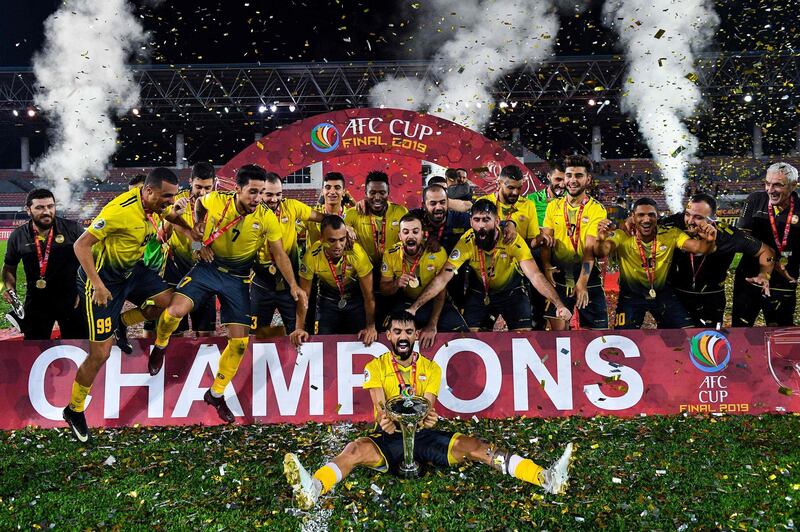 Lebanese football club Al Ahed celebrate after winning the AFC Cup Final against North Korea's April 25 Sports Club on Monday, November 4. AFP