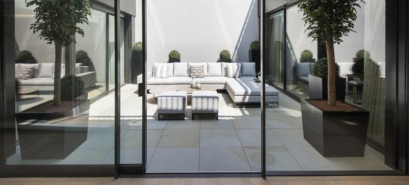 The courtyard garden inside of one of the residences at The Park Crescent. Courtesy Amazon Property