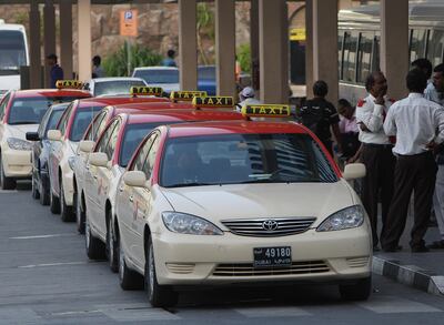 DUBAI-AUGUST18,2008 - Dubai taxi in queue  at Al Ghubaiba in Dubai after RTA  launch a new taxi stand that helps commuters to easy access on transportation . ( Paulo Vecina/the National ) *** Local Caption ***  PV Taxi 3.JPGPV Taxi 3.JPG
