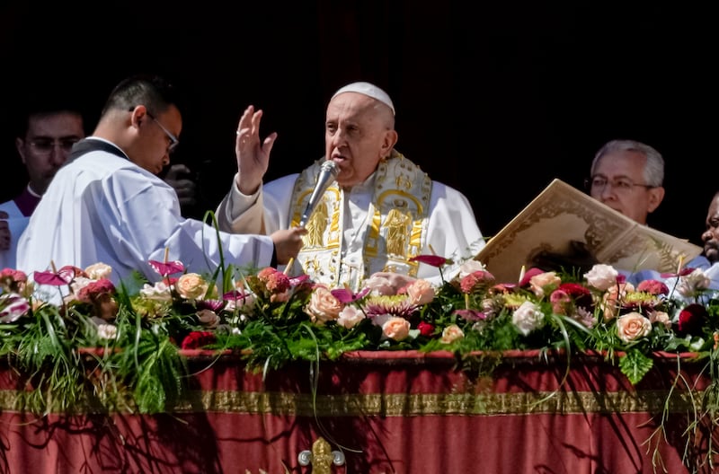 Pope Francis bestows the plenary 'Urbi et Orbi' blessing from the St Peter's Basilica at The Vatican at the end of the Easter Sunday mass. AP Photo