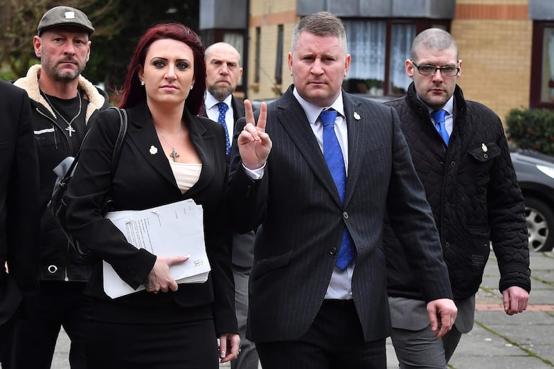(FILES) In this file photo taken on January 29, 2018 Far-right group Britain First leader Paul Golding (R) and deputy leader Jayda Fransen arrive at Folkestone magristrates court in Kent on January 29, 2018.
The deputy leader of far-right group Britain First, who hit the headlines after US President Donald Trump retweeted anti-Muslim videos she posted, was jailed on March 7, 2018 for 36 weeks for religiously-aggravated harassment. Jayda Fransen, 31, filmed and posted online videos of people who she wrongly believed were defendants in a rape trial at Canterbury Crown Court in May 2017, in a case that led to the conviction of three Muslim men and a teenager. Britain First leader Paul Golding, 36, was also found guilty and jailed for 18 weeks.
 / AFP PHOTO / BEN STANSALL