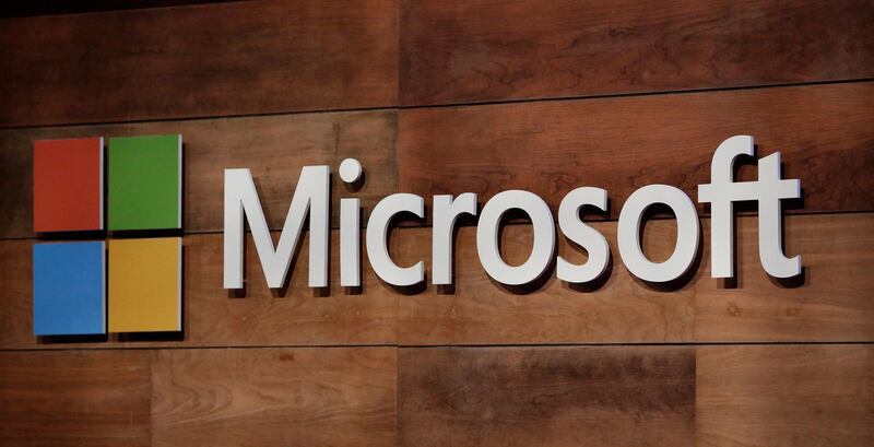 (FILES) In this file photo the Microsoft logo is pictured during the annual Microsoft shareholders meeting in Bellevue, Washington on November 29, 2017.  Microsoft will acquire artificial intelligence and cloud computing company Nuance for $19.7 billion, the company announced on April 12, 2021. Nuance's technology is used extensively in medical records, and the transaction will bolster Microsoft's healthcare offerings, Microsoft said in a news release. The transaction is all-cash and the sum includes Nuance's net debt.
 / AFP / Jason Redmond

