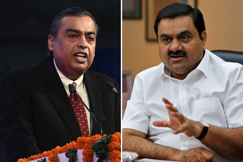 Mukesh Ambani and Gautam Adanui. The two billionaires are rushing to get a lead in an industry that is primed for growth in a country of almost 1.4 billion people. AFP/ Reuters