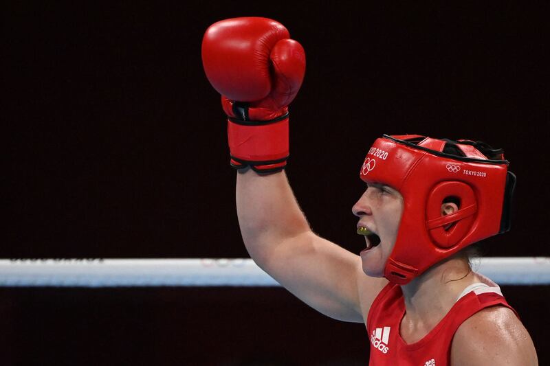 Britain's Lauren Price reacts after beating China's Li Qian during their women's middle (69-75kg) boxing final bout.