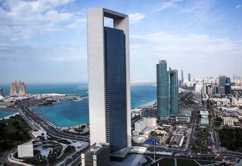 Adnoc's headquarters in Abu Dhabi. The energy company's subsidiary, Adnoc Gas, expects to list on the ADX on March 13. Mona Al Marzooqi / The National