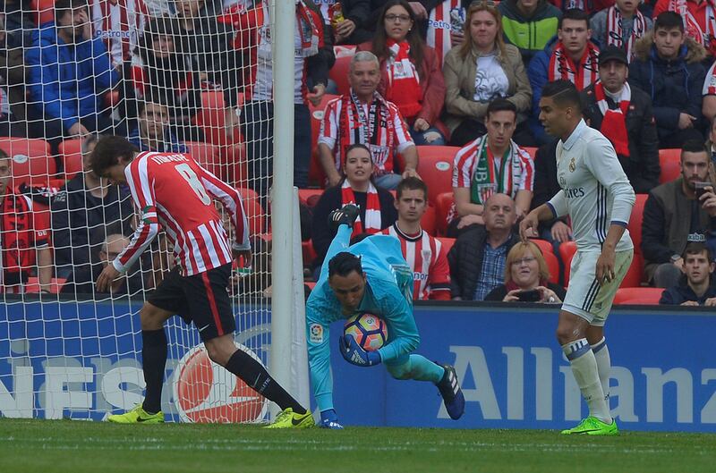 Real Madrid goalkeeper Keylor Navas stops the ball. Vincent West / Reuters