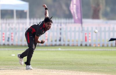 ABU DHABI , UNITED ARAB EMIRATES , October 22  – 2019 :- Zahoor Khan of UAE bowling during the World Cup T20 Qualifiers between UAE vs Jersey held at Tolerance Oval cricket ground in Abu Dhabi.  ( Pawan Singh / The National )  For Sports. Story by Paul