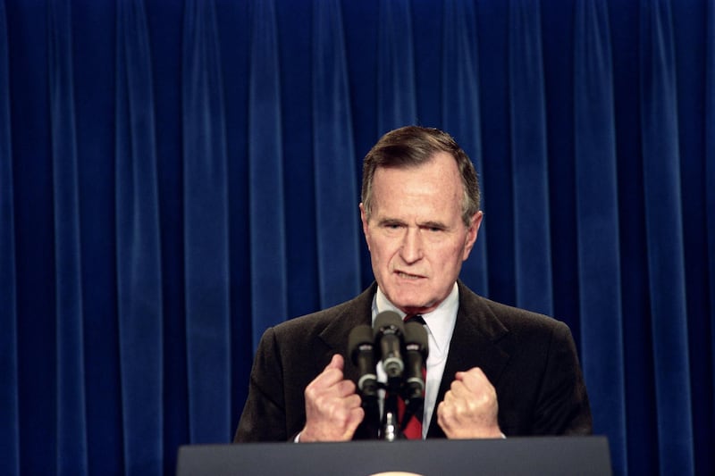 Picture taken on November 30, 1990 at Washington showing US President George Bush speaking to the nation about the U.N. authorization to use the force to end the Iraqi occupation of Kuwait. (Photo by David AKE / AFP)