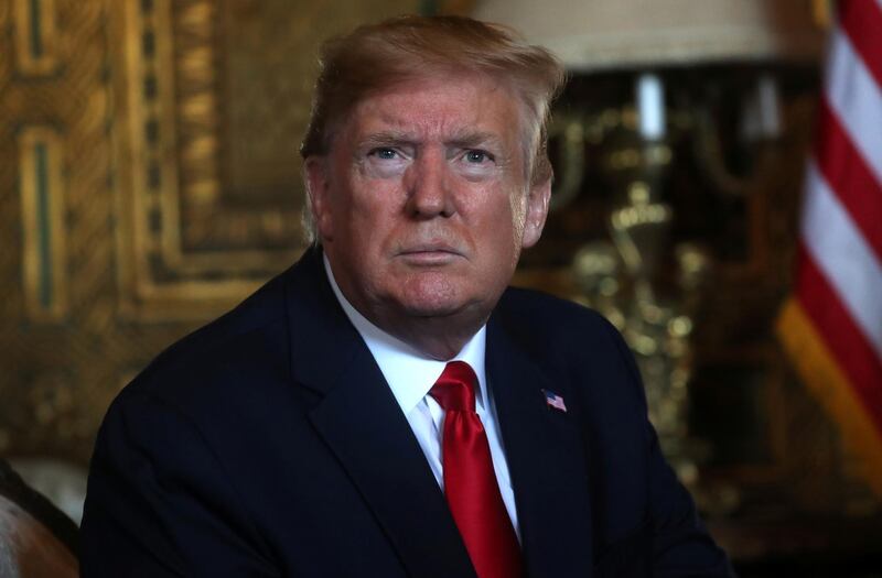 U.S. President Donald Trump speaks to the media after participating in a video teleconference with members of the U.S. military at Trump's Mar-a-Lago resort in Palm Beach, Florida, U.S., December 24, 2019. REUTERS/Leah Millis