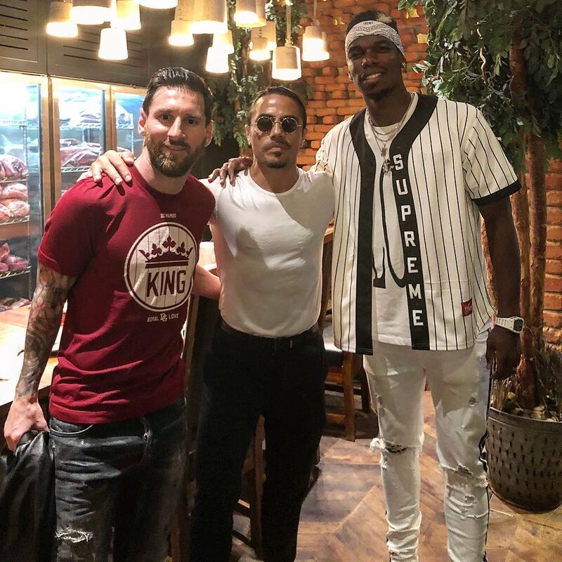 Renowned footballers Lionel Messi and Paul Pogba with Salt Bae at Nusr-Et Dubai. Photo: Instagram