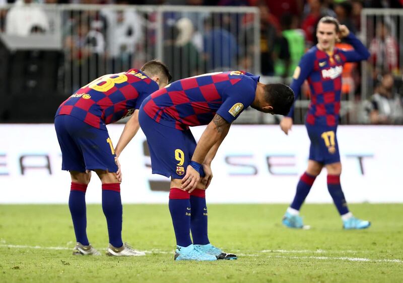 Barcelona players after the match. Reuters