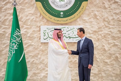 Saudi Arabia's Crown Prince Mohammed bin Salman shakes hands with Syria's President Bashar Al Assad. Reuters