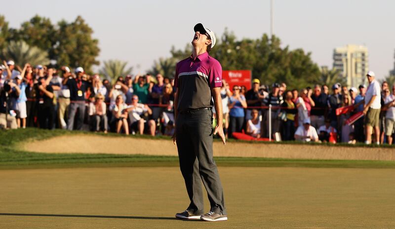 ABU DHABI, UNITED ARAB EMIRATES - JANUARY 20:  Justin Rose of England shows his frustration, after missing a putt on the 18th green to go to a play-off during day four of the Abu Dhabi HSBC Golf Championship at Abu Dhabi Golf Club on January 20, 2013 in Abu Dhabi, United Arab Emirates.  (Photo by Matthew Lewis/Getty Images) *** Local Caption ***  159764406.jpg