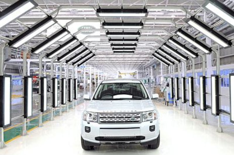 A Land Rover Freelander II SUV vehicle is seen at the Jaguar - Land Rover manufacturing plant at Pimpri, in the western Indian state of Maharashtra, on May 27, 2011. India's top vehicle maker Mumbai based Tata Motors opened its first Indian factory on May 27 for Land Rovers, the formerly loss-making British brand aiming to make inroads in the booming South Asian market. AFP PHOTO/ Indranil MUKHERJEE