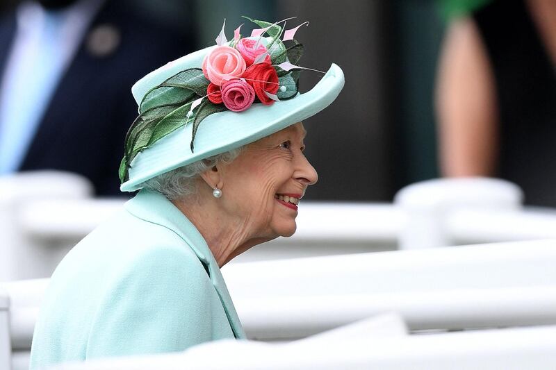 Queen Elizabeth II smiles as she arrives to attend the fifth day of the Royal Ascot horse-racing meet in Ascot, west of London. AFP