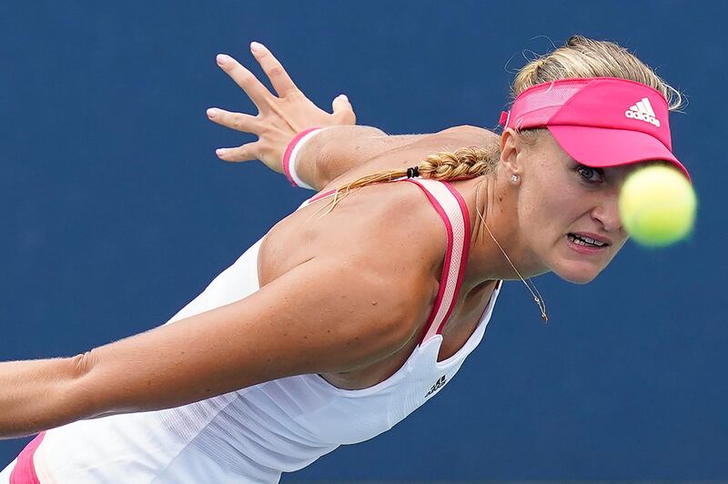 Kristina Mladenovic returns a shot to Varvara Gracheva. AP