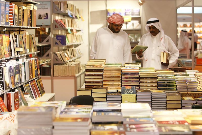 Readers browse at a local book fair. The Book Shelter hopes to encourage more people to read. Pawan Singh / The National
