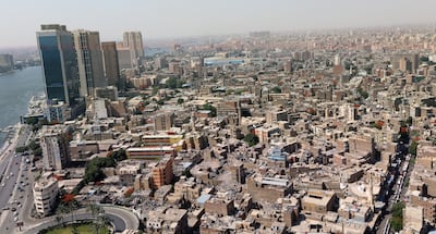 Office buildings towering above Cairo. The hot weather leads to increasing air conditioning use and pressure on the power network. EPA