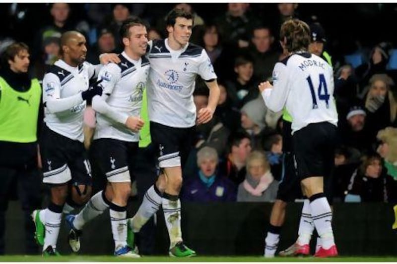 From right to left, Luka Modric, Gareth Bale and Rafael van der Vaart have all signalled their intent to stay at Tottenham.