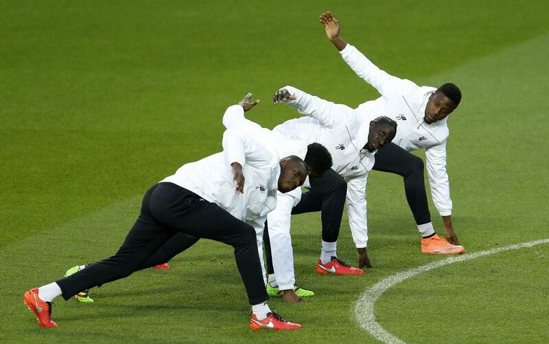 Liverpool’s Divock Origi (R), Mamadou Sakho and Christian Benteke during training. Action Images via Reuters / Lee Smith
