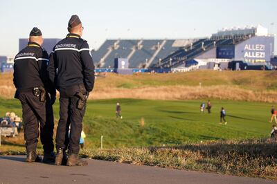 Golf - 2018 Ryder Cup at Le Golf National - Guyancourt, France, September 25, 2018    The National Gendarmerie police look on REUTERS/Charles Platiau