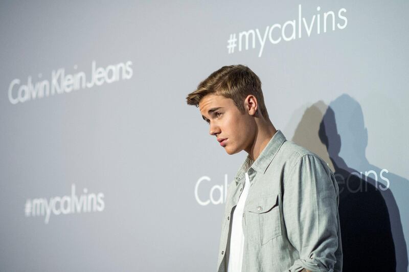 HONG KONG - JUNE 11:   Justin Bieber poses on the red carpet at the Calvin Klein Jeans music event with special appearance from Justin Bieber and performances by Jay Park, Kevin Poon, Joon & Verbal at the Kai Tak Cruise Terminal, Hong Kong, Thursday, June 11, 2015.  (Photo by Victor Fraile/Getty Images)