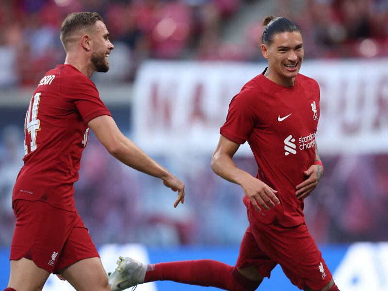 Liverpool's Darwin Nunez celebrates scoring with Jordan Henderson. AFP