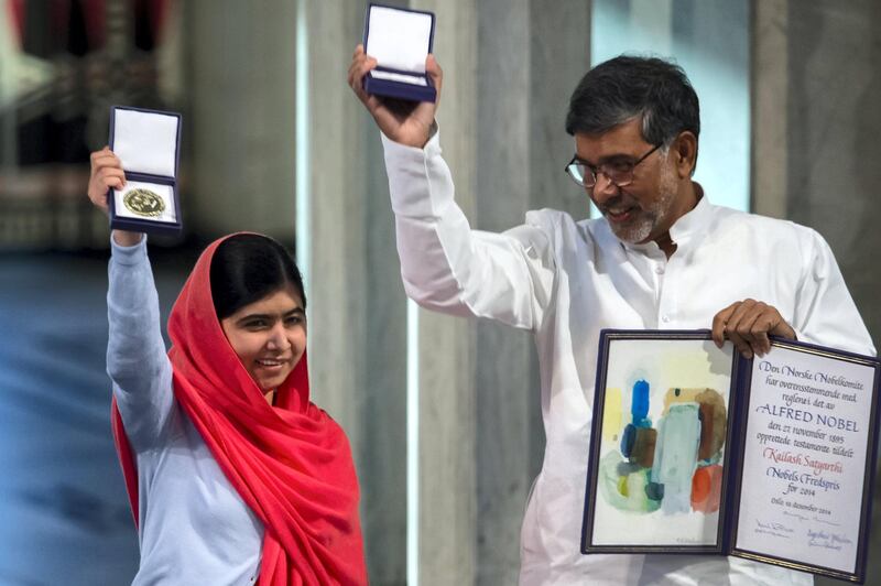 OSLO, NORWAY - DECEMBER 10: Malala Yousafzai and Kailash Satyarthi accept the Nobel Peace Prize Award during the Nobel Peace Prize ceremony at Oslo City Town Hall on December 10, 2014 in Oslo, Norway. (Photo by Nigel Waldron/Getty Images)