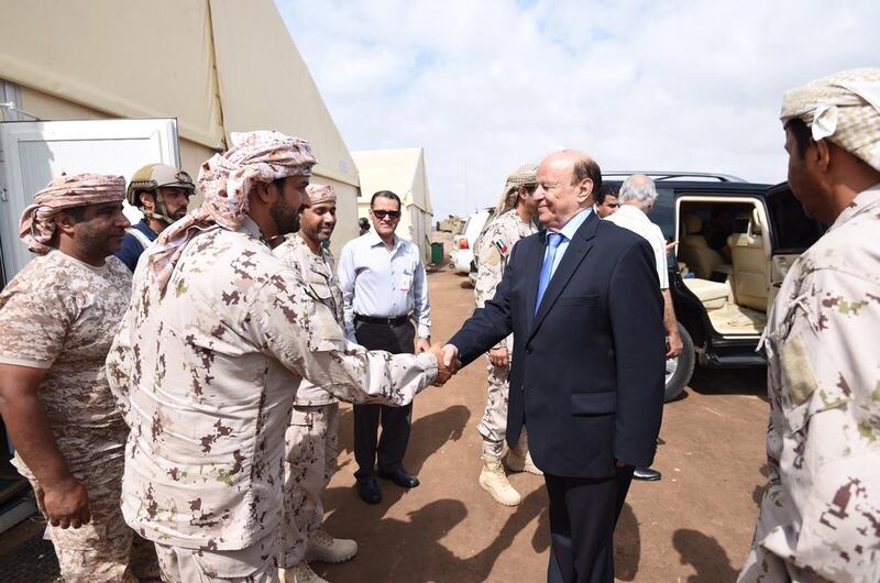 Yemeni president Abdrabu Mansur Hadi visits the headquarters of the UAE forces in Aden on Friday. Wam 