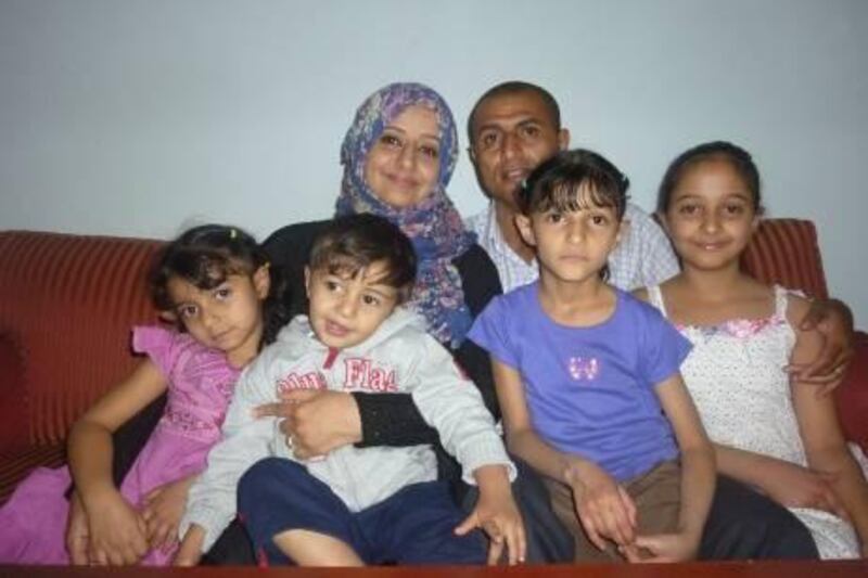 Mohammed al Qadhi's with his family in Sana'a, Yemen.

From right to left: elder daughter Maha, Mohammed al Qadhi, Haifa (wife) and youngest daughter Reema. The two in the front are : Aseel and the boy Aziz.  


Credit: Ghaida Salam.