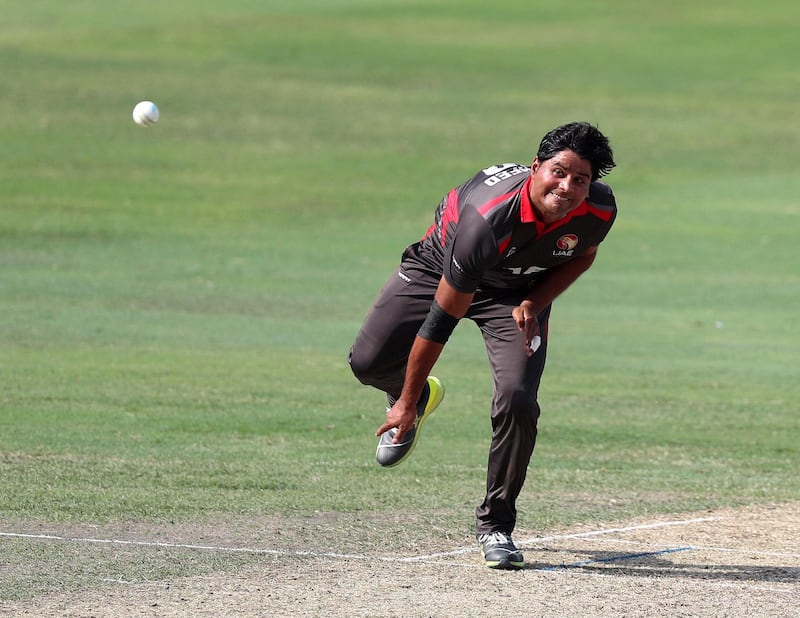 Dubai, United Arab Emirates - October 30, 2019: Waheed Ahmed of the UAE bowls during the game between the UAE and Scotland in the World Cup Qualifier in the Dubai International Cricket Stadium. Wednesday the 30th of October 2019. Sports City, Dubai. Chris Whiteoak / The National