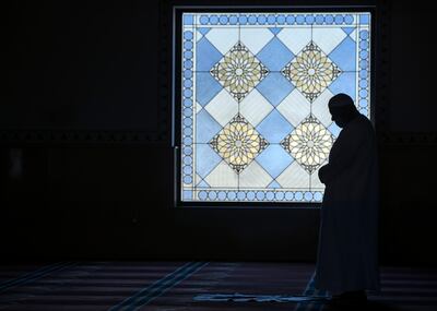 People pray at Al Farooq Omar Bin Al Khattab Mosque in Dubai. Chris Whiteoak / The National